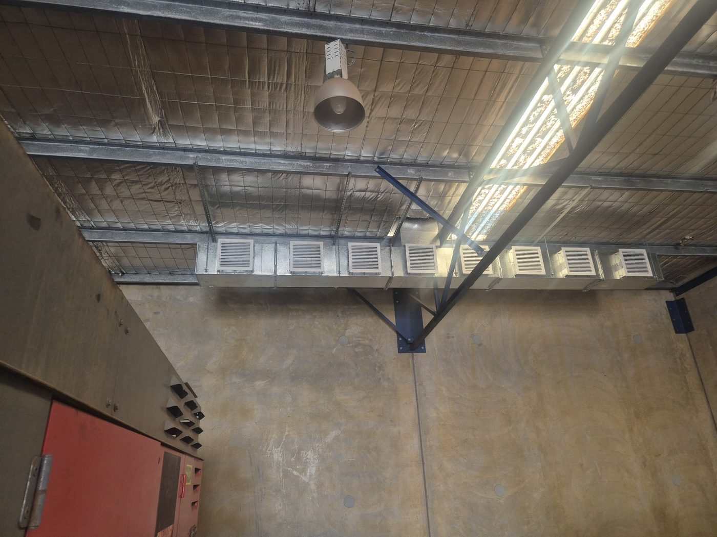 Ventilation ductwork and supply air grilles installed by Pristine Cooling in a Goldfields building