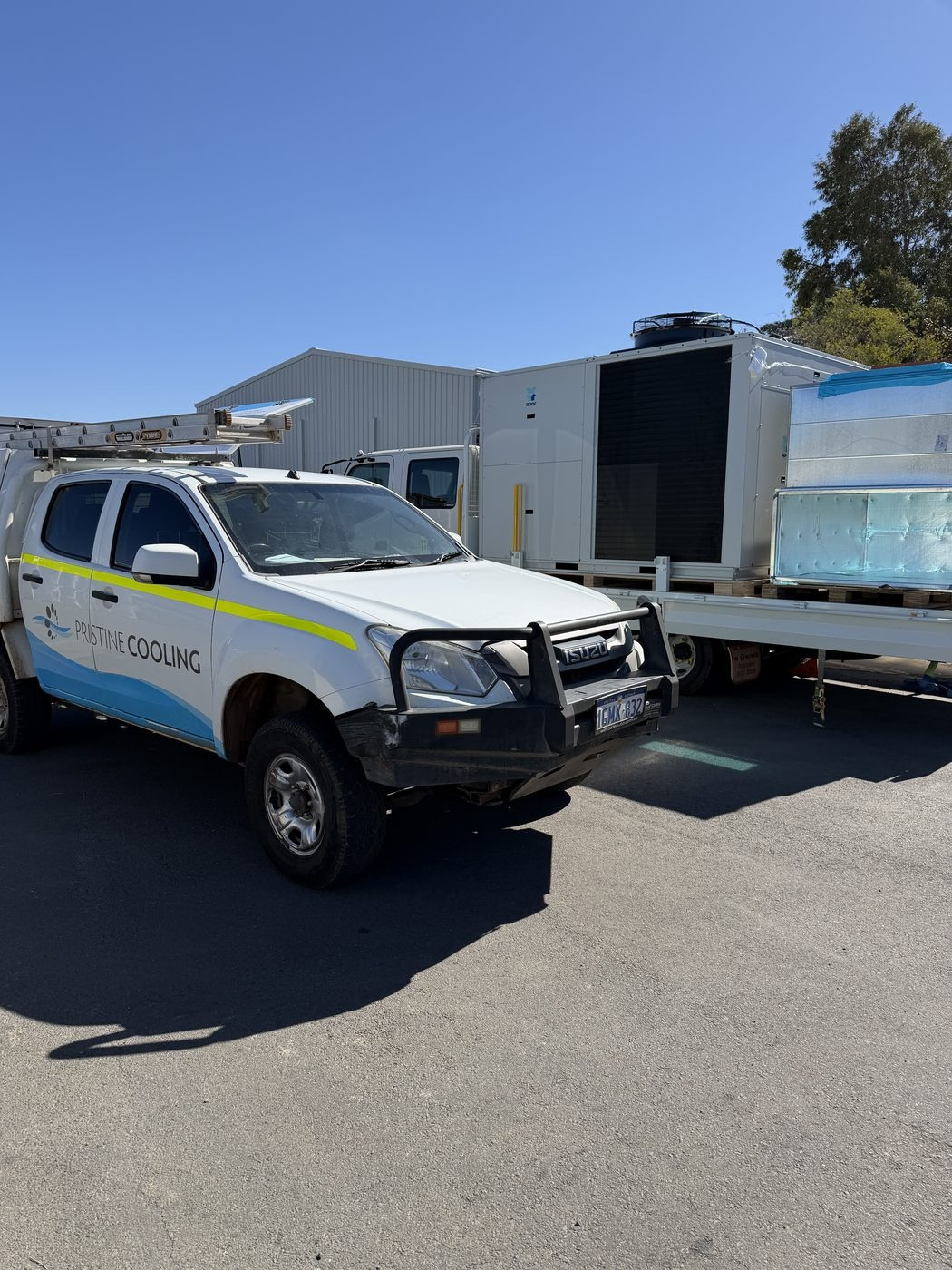 Pristine Cooling ute and the replacement package unit arriving at the camp dining hall near Kambalda