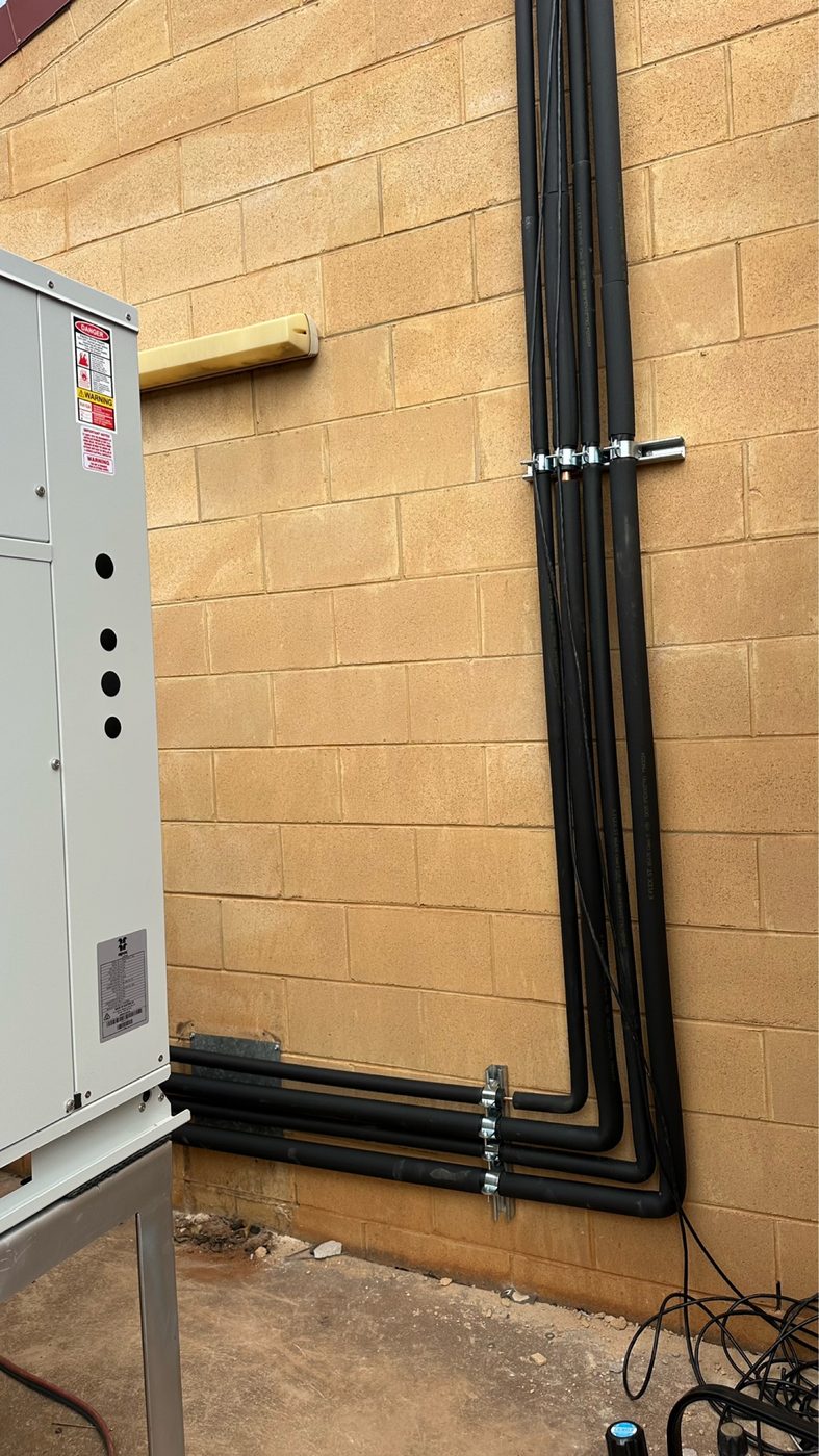 Refrigerant pipework run to the new unit at Central Regional TAFE Kalgoorlie