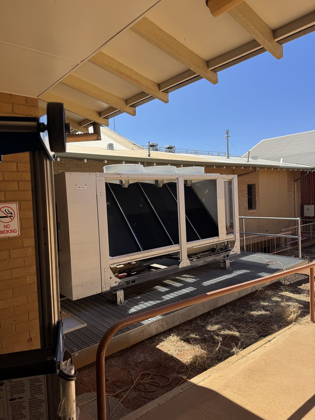 Replacement condenser coil installed on the air cooled chiller at a Kalgoorlie health campus